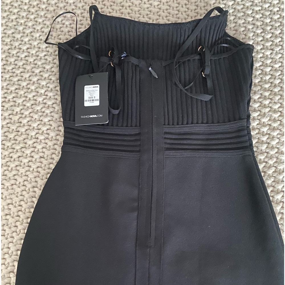 Very cute black skin tight dress. Very nice to go out in and for parties